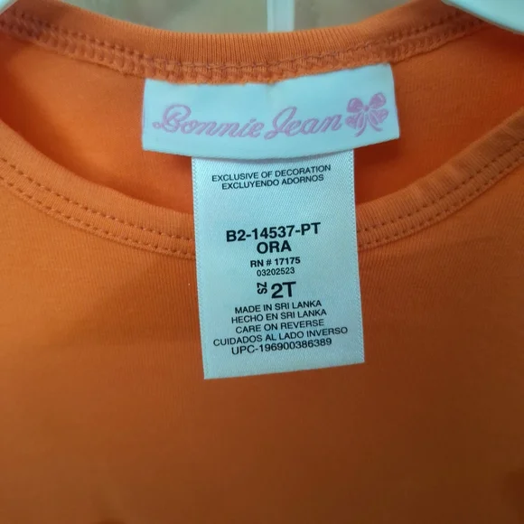 Bonnie Jean Orange Pumpkin Tunic with Cream Bows & Printed Leggings - Picture 4 of 9